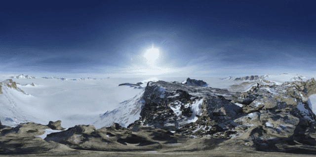 A frozen and rocky tundra, distorted like looking through a curved lense