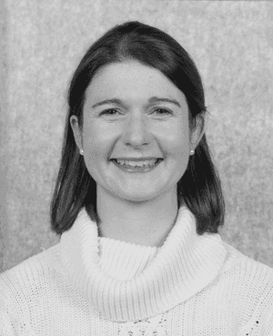 A black & white portrait of Stile team member Lara Rijksman smiling at the camera